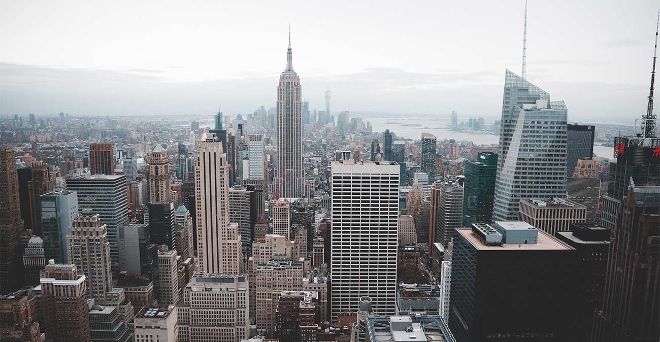 Aerial view of New York City skyline with Empire State Building.